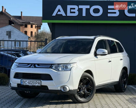 Белый Мицубиси Аутлендер, объемом двигателя 2.4 л и пробегом 148 тыс. км за 12900 $, фото 1 на Automoto.ua