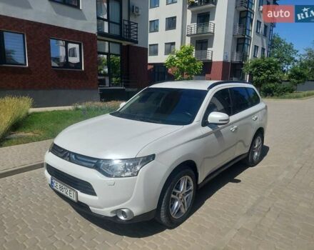 Білий Міцубісі Аутлендер, об'ємом двигуна 2.4 л та пробігом 194 тис. км за 12900 $, фото 1 на Automoto.ua