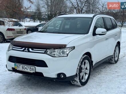 Білий Міцубісі Аутлендер, об'ємом двигуна 2.4 л та пробігом 134 тис. км за 12200 $, фото 1 на Automoto.ua