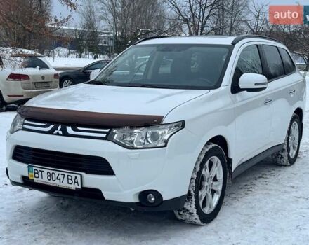 Белый Мицубиси Аутлендер, объемом двигателя 2.4 л и пробегом 134 тыс. км за 12200 $, фото 1 на Automoto.ua