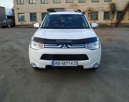 Белый Мицубиси Аутлендер, объемом двигателя 2.27 л и пробегом 280 тыс. км за 12650 $, фото 1 на Automoto.ua