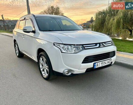 Белый Мицубиси Аутлендер, объемом двигателя 2 л и пробегом 127 тыс. км за 13200 $, фото 1 на Automoto.ua