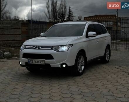 Белый Мицубиси Аутлендер, объемом двигателя 2.4 л и пробегом 196 тыс. км за 13000 $, фото 1 на Automoto.ua