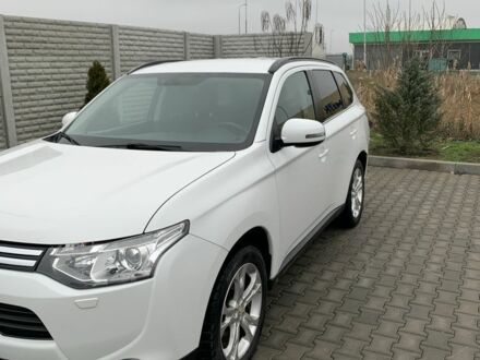 Белый Мицубиси Аутлендер, объемом двигателя 2.4 л и пробегом 203 тыс. км за 9300 $, фото 1 на Automoto.ua