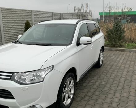 Белый Мицубиси Аутлендер, объемом двигателя 2.4 л и пробегом 203 тыс. км за 9300 $, фото 1 на Automoto.ua