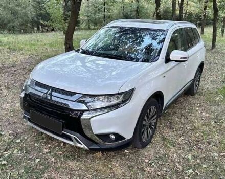 Білий Міцубісі Аутлендер, об'ємом двигуна 3 л та пробігом 109 тис. км за 10500 $, фото 1 на Automoto.ua