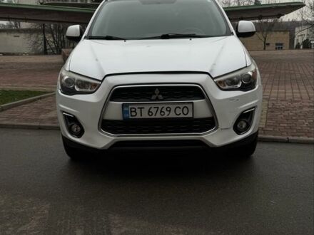Белый Мицубиси Аутлендер, объемом двигателя 2 л и пробегом 161 тыс. км за 9400 $, фото 1 на Automoto.ua