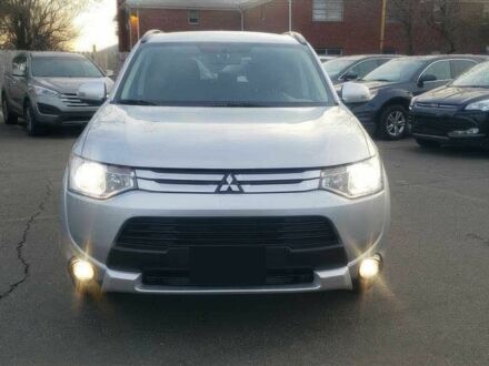 Мицубиси Аутлендер 2015 в Ужгороде на Automoto.ua Белый Мицубиси Аутлендер, объемом двигателя 2.4 л и пробегом 77 тыс. км за 4500 $, фото 1 на Automoto.ua