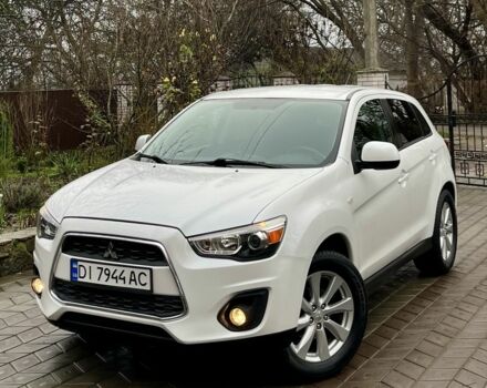 Белый Мицубиси Аутлендер, объемом двигателя 2 л и пробегом 168 тыс. км за 10800 $, фото 1 на Automoto.ua