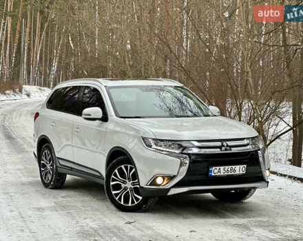 Белый Мицубиси Аутлендер, объемом двигателя 2.36 л и пробегом 160 тыс. км за 17500 $, фото 1 на Automoto.ua