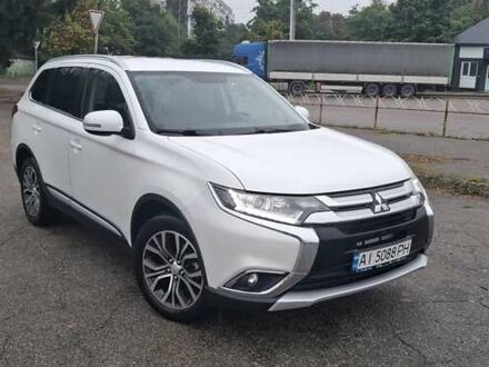 Белый Мицубиси Аутлендер, объемом двигателя 2.3 л и пробегом 158 тыс. км за 18200 $, фото 1 на Automoto.ua