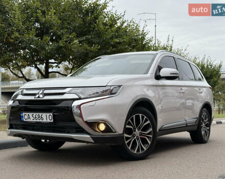 Белый Мицубиси Аутлендер, объемом двигателя 2.4 л и пробегом 160 тыс. км за 16900 $, фото 1 на Automoto.ua