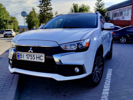 Білий Міцубісі Аутлендер, об'ємом двигуна 2.36 л та пробігом 133 тис. км за 13900 $, фото 1 на Automoto.ua