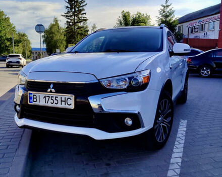 Білий Міцубісі Аутлендер, об'ємом двигуна 2.36 л та пробігом 133 тис. км за 13900 $, фото 1 на Automoto.ua