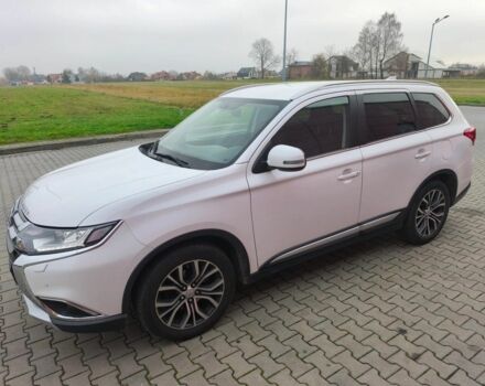 Белый Мицубиси Аутлендер, объемом двигателя 2 л и пробегом 135 тыс. км за 10200 $, фото 1 на Automoto.ua