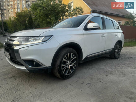 Белый Мицубиси Аутлендер, объемом двигателя 2.3 л и пробегом 190 тыс. км за 15000 $, фото 1 на Automoto.ua