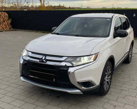 Білий Міцубісі Аутлендер, об'ємом двигуна 2.36 л та пробігом 151 тис. км за 16700 $, фото 1 на Automoto.ua