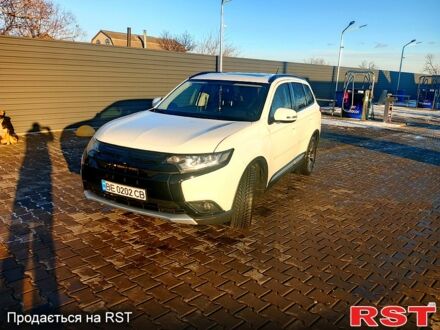 Білий Міцубісі Аутлендер, об'ємом двигуна 2.4 л та пробігом 140 тис. км за 13800 $, фото 1 на Automoto.ua