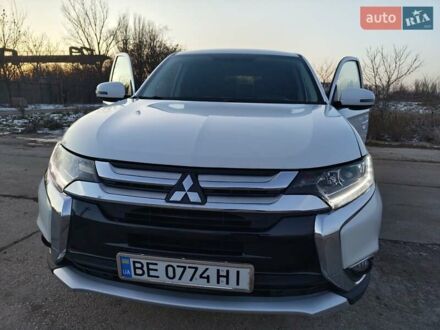 Белый Мицубиси Аутлендер, объемом двигателя 2.4 л и пробегом 148 тыс. км за 14700 $, фото 1 на Automoto.ua