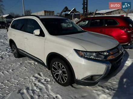 Білий Міцубісі Аутлендер, об'ємом двигуна 2.4 л та пробігом 235 тис. км за 9499 $, фото 1 на Automoto.ua