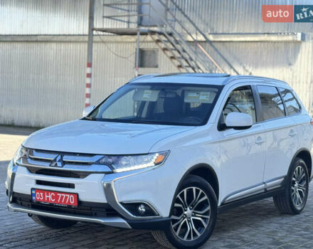 Білий Міцубісі Аутлендер, об'ємом двигуна 2.4 л та пробігом 178 тис. км за 12750 $, фото 1 на Automoto.ua