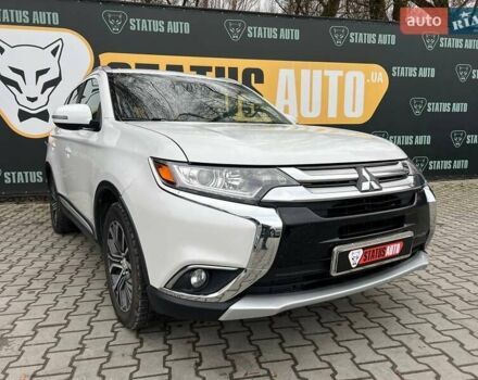 Белый Мицубиси Аутлендер, объемом двигателя 2.36 л и пробегом 153 тыс. км за 15700 $, фото 1 на Automoto.ua
