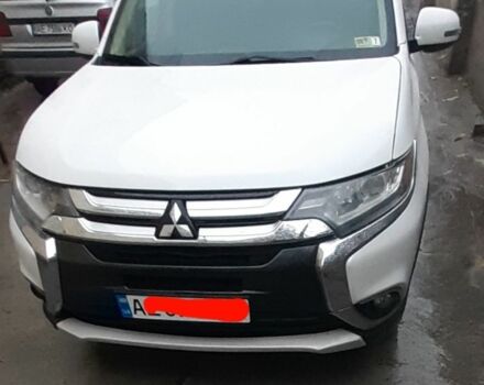 Белый Мицубиси Аутлендер, объемом двигателя 2.4 л и пробегом 158 тыс. км за 15000 $, фото 1 на Automoto.ua