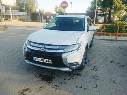Белый Мицубиси Аутлендер, объемом двигателя 2.4 л и пробегом 70 тыс. км за 17500 $, фото 1 на Automoto.ua