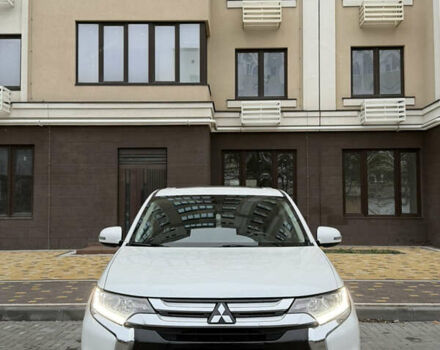 Белый Мицубиси Аутлендер, объемом двигателя 2.4 л и пробегом 53 тыс. км за 16900 $, фото 1 на Automoto.ua