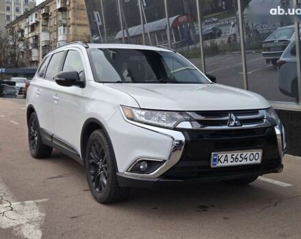 Белый Мицубиси Аутлендер, объемом двигателя 2.4 л и пробегом 115 тыс. км за 19300 $, фото 1 на Automoto.ua