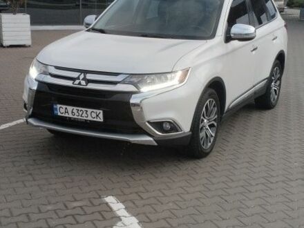 Белый Мицубиси Аутлендер, объемом двигателя 2.4 л и пробегом 119 тыс. км за 17800 $, фото 1 на Automoto.ua