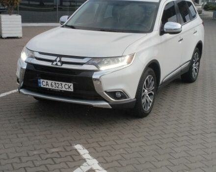 Белый Мицубиси Аутлендер, объемом двигателя 2.4 л и пробегом 119 тыс. км за 17800 $, фото 1 на Automoto.ua