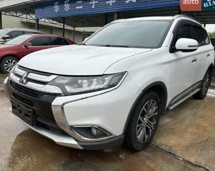 Белый Мицубиси Аутлендер, объемом двигателя 2.4 л и пробегом 52 тыс. км за 18000 $, фото 1 на Automoto.ua