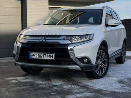 Білий Міцубісі Аутлендер, об'ємом двигуна 2.4 л та пробігом 91 тис. км за 19199 $, фото 1 на Automoto.ua