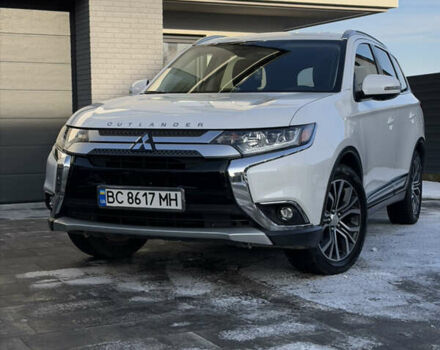 Белый Мицубиси Аутлендер, объемом двигателя 2.4 л и пробегом 91 тыс. км за 19199 $, фото 1 на Automoto.ua