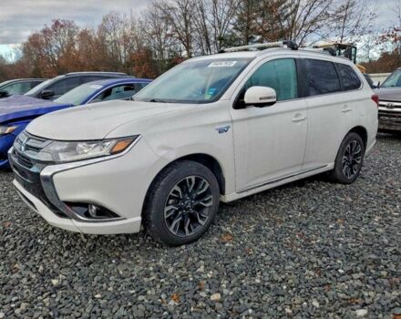 Белый Мицубиси Аутлендер, объемом двигателя 2 л и пробегом 73 тыс. км за 4000 $, фото 1 на Automoto.ua