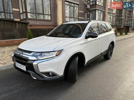 Белый Мицубиси Аутлендер, объемом двигателя 2.4 л и пробегом 130 тыс. км за 15700 $, фото 1 на Automoto.ua