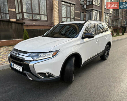 Білий Міцубісі Аутлендер, об'ємом двигуна 2.4 л та пробігом 130 тис. км за 15700 $, фото 1 на Automoto.ua