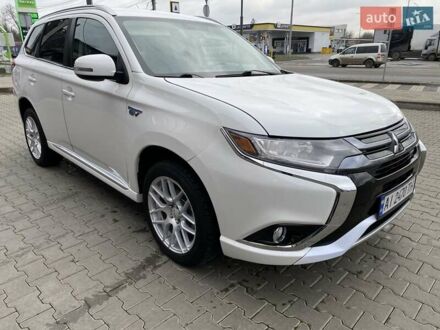 Білий Міцубісі Аутлендер, об'ємом двигуна 2 л та пробігом 118 тис. км за 17800 $, фото 1 на Automoto.ua