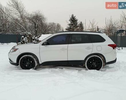 Білий Міцубісі Аутлендер, об'ємом двигуна 2.4 л та пробігом 162 тис. км за 16500 $, фото 1 на Automoto.ua