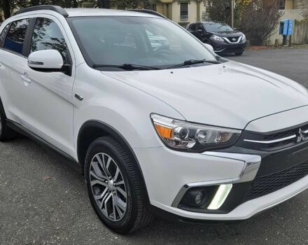 Белый Мицубиси Аутлендер, объемом двигателя 2.4 л и пробегом 30 тыс. км за 10500 $, фото 1 на Automoto.ua