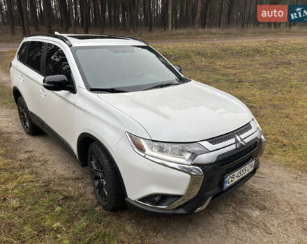 Белый Мицубиси Аутлендер, объемом двигателя 2.4 л и пробегом 130 тыс. км за 16200 $, фото 1 на Automoto.ua
