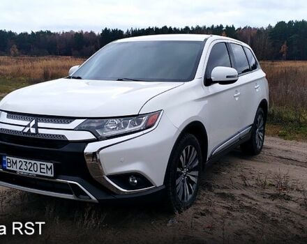 Білий Міцубісі Аутлендер, об'ємом двигуна 2.4 л та пробігом 122 тис. км за 17400 $, фото 1 на Automoto.ua