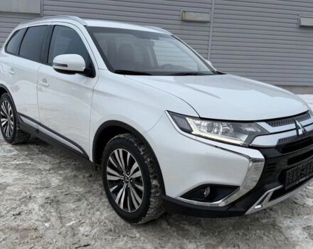 Белый Мицубиси Аутлендер, объемом двигателя 2.4 л и пробегом 98 тыс. км за 10500 $, фото 1 на Automoto.ua