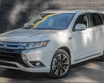 Белый Мицубиси Аутлендер, объемом двигателя 2 л и пробегом 89 тыс. км за 8500 $, фото 1 на Automoto.ua