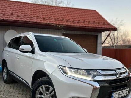 Белый Мицубиси Аутлендер, объемом двигателя 2 л и пробегом 161 тыс. км за 18000 $, фото 1 на Automoto.ua