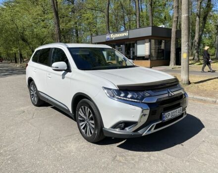 Білий Міцубісі Аутлендер, об'ємом двигуна 2.4 л та пробігом 147 тис. км за 21000 $, фото 1 на Automoto.ua