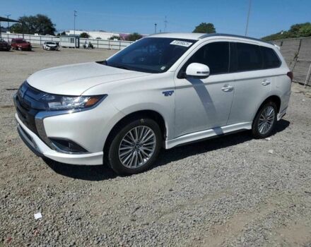 Белый Мицубиси Аутлендер, объемом двигателя 2 л и пробегом 54 тыс. км за 4200 $, фото 1 на Automoto.ua