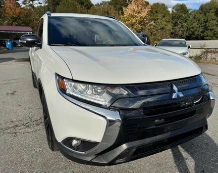 Білий Міцубісі Аутлендер, об'ємом двигуна 2.4 л та пробігом 32 тис. км за 8800 $, фото 1 на Automoto.ua