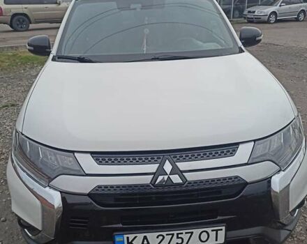 Білий Міцубісі Аутлендер, об'ємом двигуна 2.36 л та пробігом 170 тис. км за 18200 $, фото 1 на Automoto.ua